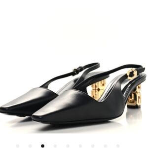 Givenchy Elegant Black Slingback Heels with Gold Accents